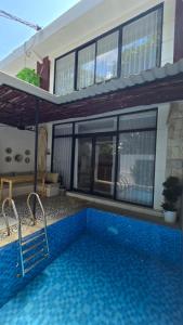 Πισίνα στο ή κοντά στο Villa 3 Green Minimalist 1 Room In Sanur
