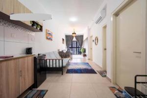 a hallway with a kitchen and a living room at Canopy Hill Kajang 2 in Kajang