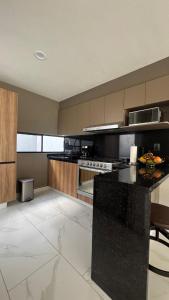 Η κουζίνα ή μικρή κουζίνα στο House Alto 58 Xochitepec Morelos +13 φωτογραφίες