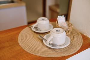 Příslušenství pro přípravu čaje a kávy v ubytování The Hita Apartement + 14 fotografií