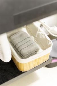 Postel nebo postele na pokoji v ubytování 113-Studio Amplo e completo com ar condicionado prox UEL