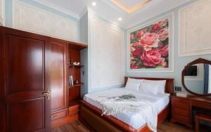 Ένα ή περισσότερα κρεβάτια σε δωμάτιο στο Ben Thanh Maison +54 φωτογραφίες