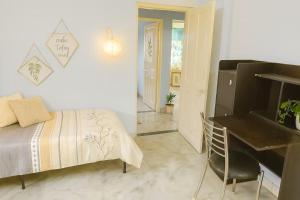 Ένα ή περισσότερα κρεβάτια σε δωμάτιο στο Grace Garden