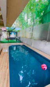 Πισίνα στο ή κοντά στο Ronnes ROYALE DUPLEX 3BHK with private pool