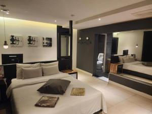 Ένα ή περισσότερα κρεβάτια σε δωμάτιο στο Hotel Yaja Sasang Terminal