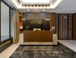 a lobby of a hotel with a reception desk at BBQ Hotel with Swimming Pool in Lạng Sơn in Lạng Sơn +38 photos