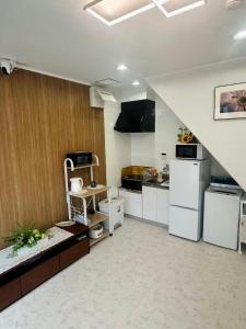 Kuchyň nebo kuchyňský kout v ubytování Villa Koedo + 4 fotografie