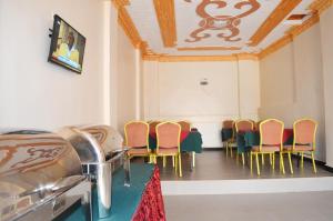 a row of chairs in a waiting room at Mt. Zion Hotel Annex in Kampala