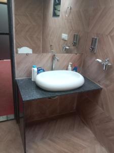 Ένα μπάνιο στο Gennys farmhouse