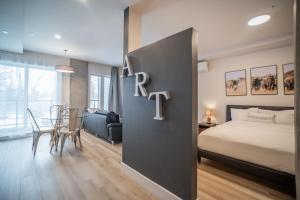 Postel nebo postele na pokoji v ubytování Corporate Stays La Vigie 2 - Studio