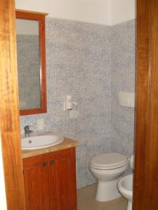 Koupelna v ubytování B&B Frammenti D'Itria + 27 fotografií