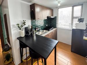 Η κουζίνα ή μικρή κουζίνα στο Destiny Hotel - 1606