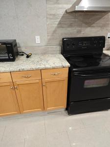 Kuchyň nebo kuchyňský kout v ubytování Chamber Inn