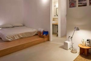 En eller flere senge i et værelse på Tiaohai Living Youth Hotel + 92 billeder