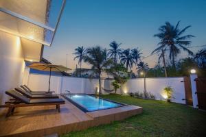 Swimmingpoolen hos eller tæt på Villa D8