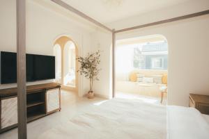 TV/trung tâm giải trí tại DOMO Mountain View Hotel