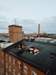 a view of the roof of a building at Uumen Hotels - Tampere, Finlayson in Tampere