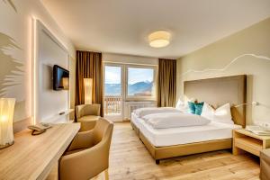 TV a/nebo společenská místnost v ubytování Garni Hotel Kessler