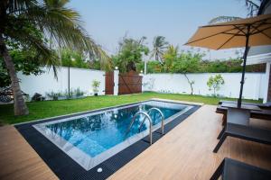 Swimmingpoolen hos eller tæt på Villa D8