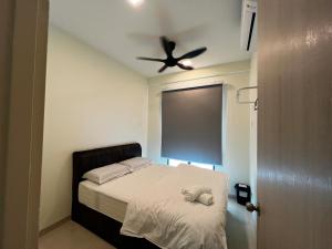 Postel nebo postele na pokoji v ubytování AP Homestay