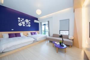Postel nebo postele na pokoji v ubytování 極簡旅行民宿 Simple Travel B&B + 37 fotografií