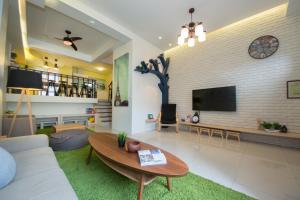 En TV eller et underholdningssystem på 極簡旅行民宿 Simple Travel B&B