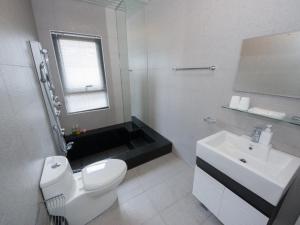 Et bad på 極簡旅行民宿 Simple Travel B&B
