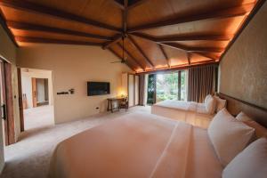 Postel nebo postele na pokoji v ubytování Kira Baya Koh Samed