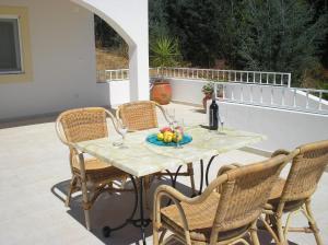 En terrasse eller udendørsområde på Vivenda Pirilampo