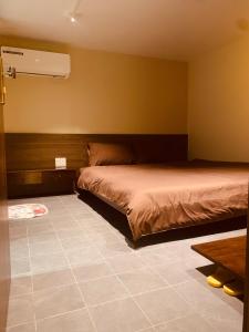 a bedroom with a bed in a room at Châu Home in Ninh Binh