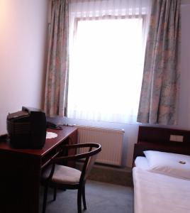 Postel nebo postele na pokoji v ubytování Hotel Filoxenia