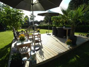 Φωτογραφία από το άλμπουμ του Bed & Breakfast Meerbusch σε Meerbusch +28 φωτογραφίες