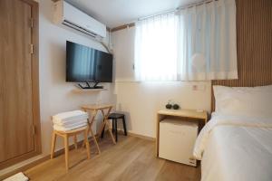 Μια τηλεόραση ή/και κέντρο ψυχαγωγίας στο stay105행궁