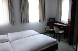Postel nebo postele na pokoji v ubytování Hotel Filoxenia