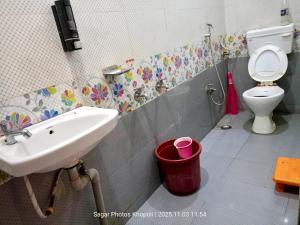 Ένα μπάνιο στο Hotel River Garden Guest House