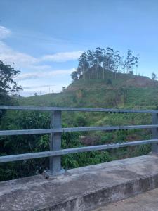 a view of a hill from a bridge at River Line -Ella in Ella