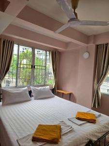 Ένα ή περισσότερα κρεβάτια σε δωμάτιο στο Bella Bella Riverview