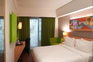 Ένα ή περισσότερα κρεβάτια σε δωμάτιο στο G'Sign Style Hotel +41 φωτογραφίες