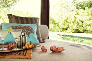 Ένα ή περισσότερα κρεβάτια σε δωμάτιο στο Four Seasons Resort Maldives at Kuda Huraa