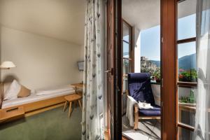 Ένα ή περισσότερα κρεβάτια σε δωμάτιο στο Hotel Puint