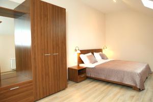 Postel nebo postele na pokoji v ubytování Sky Hotel