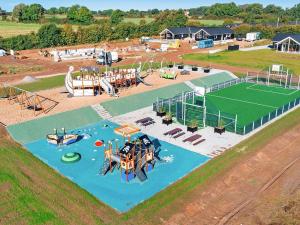 an aerial view of a water park with a playground at 16 person holiday home in Sydals in Sarup