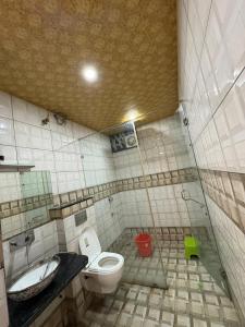 Koupelna v ubytování Hotel Nandini