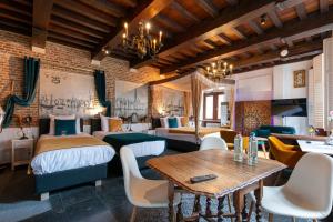 Posezení v ubytování Charming Suites Jan Zonder Vrees