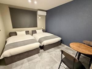 Ένα ή περισσότερα κρεβάτια σε δωμάτιο στο SEVEN House