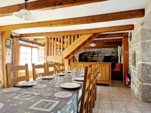a dining room with a table and chairs at Gîte de Saint-Gervais in Saint-Gervais