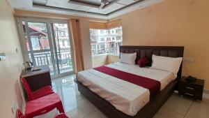 Postel nebo postele na pokoji v ubytování Serene Vista Dharamshala