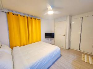 Postel nebo postele na pokoji v ubytování Stay Yeon