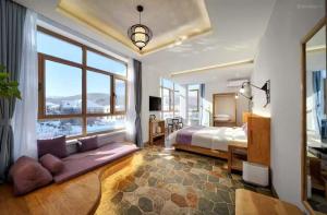 Ένα ή περισσότερα κρεβάτια σε δωμάτιο στο Liangqi Qingyun Homestay,Yabuli