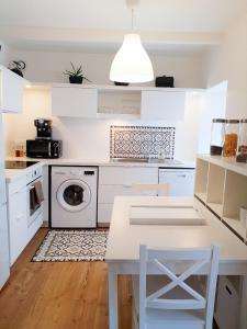 Kuchyň nebo kuchyňský kout v ubytování Hyper centre, quartier du port